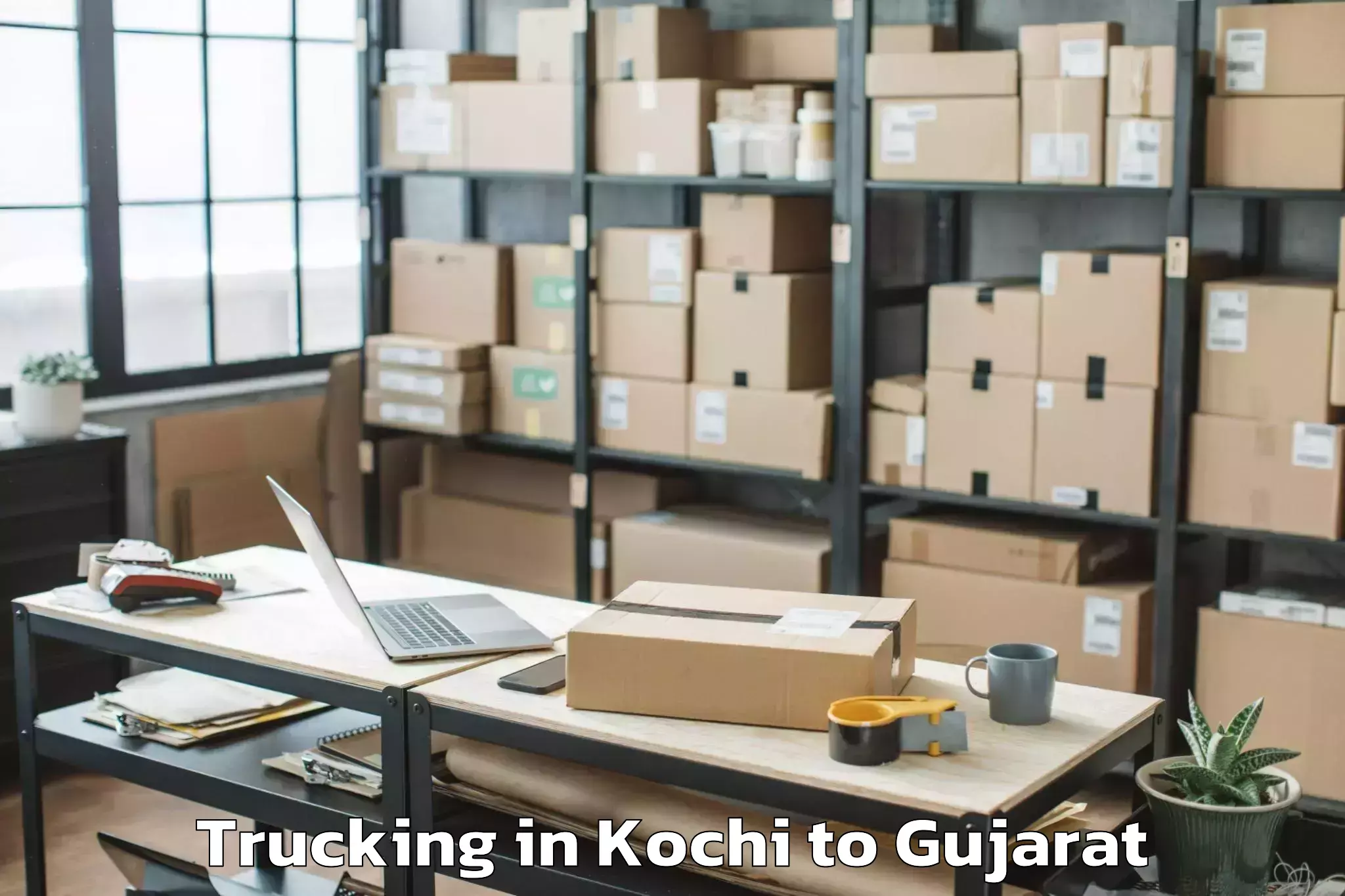 Hassle-Free Kochi to Gujarat National Law Universit Trucking